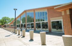 Exterior view of the Ridgeland Common Recreation Complex with large windows and brick facade.